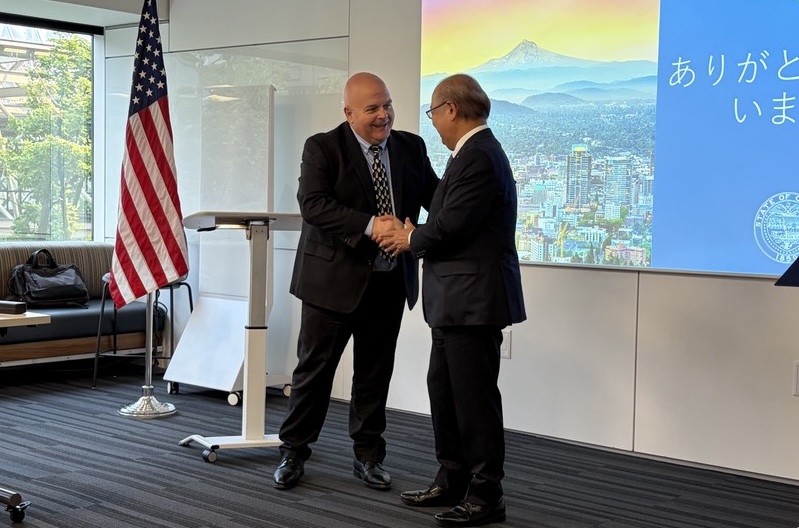 OMEP President Mike Vanier shakes hands with Toyama Governor Hachiro Nitta during the Oregon-Toyama sister-state delegation event in Portland.